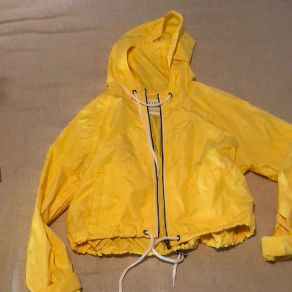 yellow cropped windbreaker